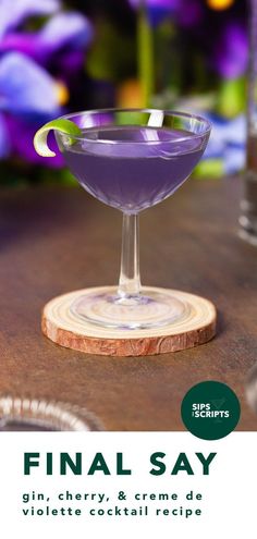 a purple cocktail in a coupe glass on a wooden table with the words final say written below it