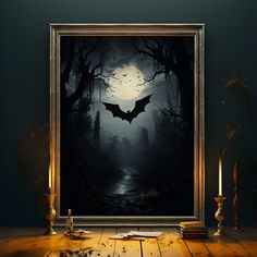 a painting on the wall with candles in front of it and an image of a bat