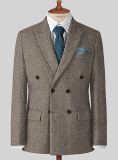 Sophisticated attire that doesn't sacrifice practicality in favor of elegance. Crafted from wool, our brown tweed suit is ideal for any occasion. Pair back your look with a white shirt and brown shoes to liven it up.   
 
 Look Includes  Dapper Brown Tweed Fabric  Double Breasted Jacket Style  Peak Lapel  Horn Brown Buttons  Single Vent  Three Cuff Buttons  Two welted back pockets on trousers   You can change the look during customization if required. 
  Lining: Viscose; Dry Clean.