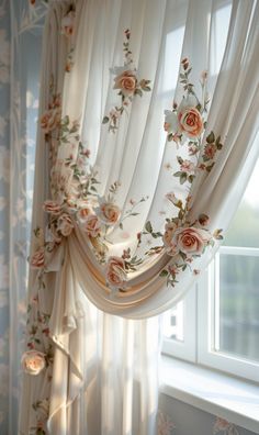 curtains with flowers on them are hanging in front of a window, and the curtain is closed