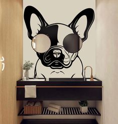 a black and white dog with glasses on it's face is in the bathroom