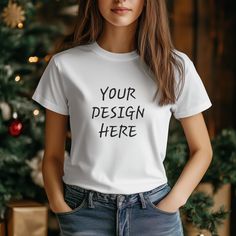 Hi there! 👋 Transform the presentation of your designs with our high-quality Christmas tshirt mockup,  specially designed for demanding creators and online entrepreneurs. Whether you are a graphic designer, seller of personalized Christmas tee shirt, or an online store owner, our Christmas mockups will allow you to showcase your creations in the best light. Product Features: - High Quality: Our Christmas mockups are meticulously crafted to offer a realistic and attractive representation of your Christmas Tshirt Mockup, Gift Crew Neck T-shirt With Sublimation Print, Sublimation Print Crew Neck T-shirt For Gift, Crew Neck T-shirt With Sublimation Print As Gift, Customizable Crew Neck Christmas T-shirt, Christmas Short Sleeve T-shirt With Custom Print, Christmas Custom Print Short Sleeve T-shirt, Gift Crew Neck T-shirt With Custom Print, Clothes Mockup Free