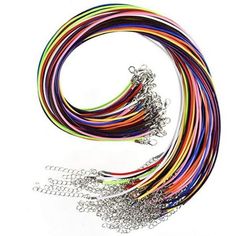 an assortment of colorful wires on a white background