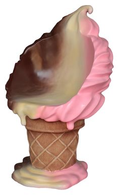 an ice cream cone with chocolate and pink icing on it's top is shown