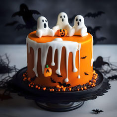 a halloween cake decorated with white icing and ghost decorations