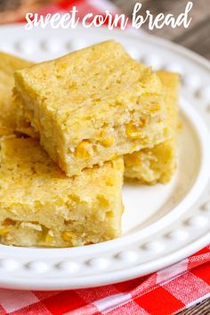 three pieces of cornbread on a white plate