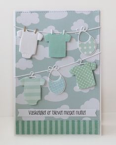 a card with clothes hanging on a line and the words vakskoltt er blevet medgett nurit