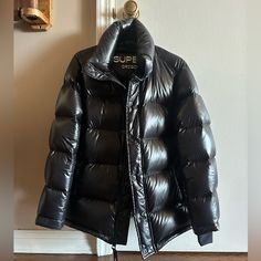 Aritzia Super Puff Jacket In Hi-Gloss Black. Size Xs - Barely Worn. Super Warm! Comes With Hood. Luxury Black Down Puffer Jacket, Luxury Black Duck Down Outerwear, Black Down Puffer Jacket With Padded Collar, Fitted Black Duck Down Outerwear, Black Duck Down Puffer Outerwear, Black Duck Down Puffer Jacket For Fall, Black Duck Down Outerwear With Padded Collar, Luxury Black Puffer Outerwear, Luxury Duck Down Puffer Outerwear