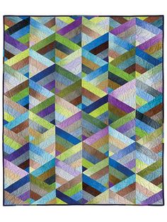 a multicolored quilt with many different colors