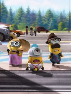 three minion characters standing in front of a parking lot