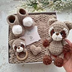 This adorable baby gift set is the perfect present for any special occasion, from baby showers to birthdays. It includes a cozy, hand-knit blanket, plush raccoon toy, gentle rattle, soft booties with fluffy pom-poms, and a heart for personalization. Made with high-quality, baby-safe materials, each piece is crafted to be soft, durable, and irresistibly cute. The raccoon theme adds a charming, woodland touch that makes this set a unique keepsake. Whether you're celebrating a newborn or looking for a thoughtful holiday gift, this set will bring warmth, comfort, and joy to any little one's world. Newborn Pattern, Toys For Newborns, Hand Knit Blanket, Newborn Toys, Be Soft, Baby Box, Gifts For Baby