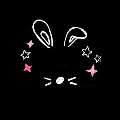 a black background with pink and white stars in the shape of a rabbit's head