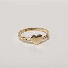 "Thanks for shopping our vintage estate store. We tend to sell well below wholesale and truly hope you enjoy all of our items. Many of the items are one of a kind, so please enjoy scrolling through the pictures and hopefully something will catch your eye. Brown spots are from camera or reflections. Estate 14k yellow gold heart baby ring. Custom made ring for our shop.  Ring size: 3 or 3.25 please select size Setting: 5mm 1/4\" Band width: 1.5mm Weight: .82 gram Marked 14k and it's sweet. One tha Classic Yellow Gold Ring With Heart Charm, Classic Yellow Gold Heart Ring With Birthstone, Classic Gold Heart Ring With Heart Charm, Vintage Yellow Gold Heart Ring As A Gift, Classic Gold Heart Ring With Charm, Vintage Adjustable Heart Ring For Wedding, Vintage Yellow Gold Heart Ring Gift, Adjustable Vintage Heart Ring For Weddings, Gold Hallmarked Heart Ring In 14k Gold