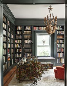 a living room filled with lots of books