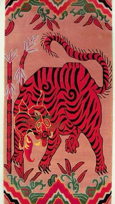 a red and black rug with a tiger on it