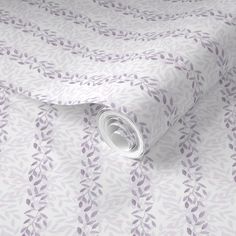 an image of a white and purple wallpaper with leaves pattern on it's surface