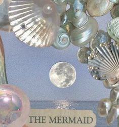 closeup of shuffle collage with seashells, the ocean, the moon and pearls, mermaid aesthetic