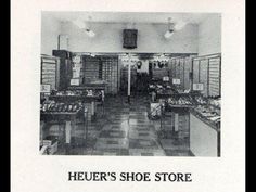 an old black and white photo of a shoe store with the words heuer's shoe store