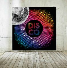 an image of a disco ball with the number thirty on it in front of a wall