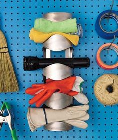 various tools are arranged on a peg board