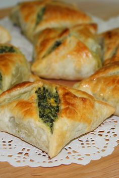 several small pastries on a wooden cutting board