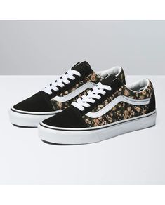 First known as the Vans #36, the Old Skool debuted in 1977 with a unique new addition: a random doodle drawn by founder Paul Van Doren, and originally referred to as the “jazz stripe.” Today, the famous Vans Sidestripe has become the unmistakable—and instantly recognizable—hallmark of the Vans brand. Featuring a vintage floral print that pops against a black background, the Rose Dreams Old Skool pays homage to our heritage while ensuring that this low top, lace-up shoe remains as iconic as ever. Rare Vans, Old School Vans, Van Doren, Custom Made Shoes, Beach Stores, Black Vans, Vintage Floral Print, Dream Shoes, Side Stripe