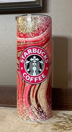 a starbucks coffee can sitting on top of a table