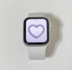 an apple watch with a heart on the screen