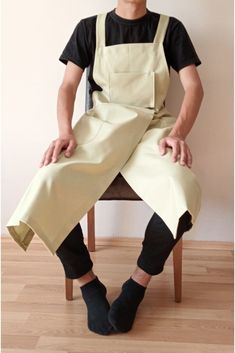 The Slipster Pottery apron features a split foot design to accommodate working on the potter's wheel. Convenient pockets on chest and on each leg for easy access to your clay tools. Canvas material is durable for working with clay.Linen aprons with pockets, washed diagonally on the back. The light and soft apron will give you a stylish and mess-free cooking experience. Aprons come in sizes S-M and L-XL for the best fit. The apron set is a great gift idea for anyone who loves to cook, do crafts o Pottery Apron Pattern Free, Barista Uniform, Pottery Apron, Split Leg Apron, Linen Aprons, Aprons With Pockets, Japanese Style Apron, Apron Pattern Free, Do Crafts