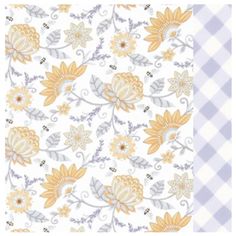 a white and yellow floral pattern with gingham checkered tablecloth on it