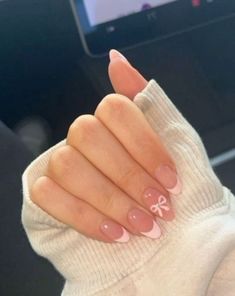 #nails#bow#frenchtips Teens Nails Design, Cute Nails Winter Simple, Pink French Tip Nails With Snowflake, Almond Nails Designs Bow, Winter Basic Nails, Almond Nails Bow Design, How To Do Bows On Nails, French With Bow Nails, Bow Design On Nails