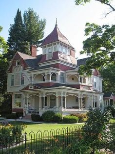 an old victorian style house with a turret