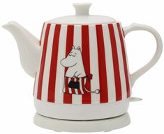 a red and white striped tea pot with a moomi on it's side