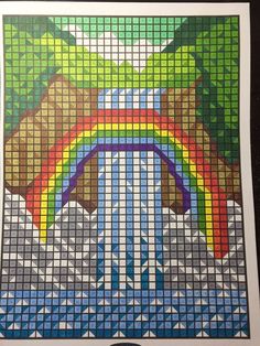 an image of a cross stitch pattern with trees and rainbows