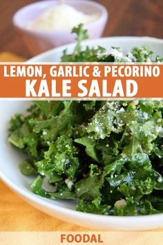 kale salad with lemon, garlic and pecorino in a white bowl on a wooden table