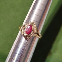 14k Solid Yellow Gold Ring Sz 7 Center Stone Is A Genuine Untreated Marquise Cut Ruby Surrounding By Earth Mined Baguette And Round Diamonds. This Ring Is Just Beautiful! Ring Color, Just Beautiful, Yellow Gold Ring, Marquise Cut, Solid Yellow, Yellow Gold Rings, Red Gold, Gold Ring, Round Diamonds