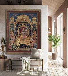 a painting hanging on the wall above a couch in a room with wooden floors and walls