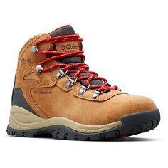 a brown hiking boot with red laces on the side