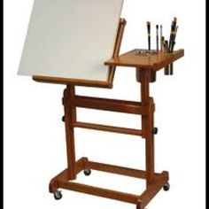 a wooden easel with a white board on it