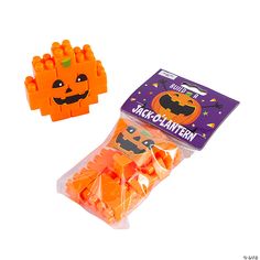 an assortment of halloween candies in plastic bags on a white background with the package