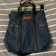 This Is A Blue Prestige Tote Bag/Shoulder Bag. It Is Brand New. Bag Measures 15” X 15”. Has Many Pockets Both On Inside And Outside. Appears To Be Canvas Navy Blue With Black Detailing. Guess Shoulder Bag, Prada Purses, Neon Bag, Hobo Tote Bag, Steve Madden Handbags, Blue Purse, Brown Leather Shoulder Bag, American Leather, Black Tote