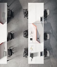 an overhead view of office desks and chairs