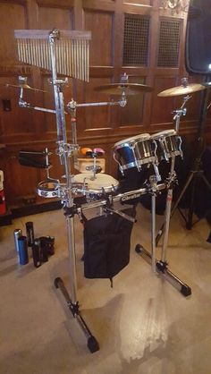 a drum set is sitting in the middle of a room