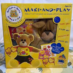 a yellow box with two teddy bears in it's front and the inside of its packaging