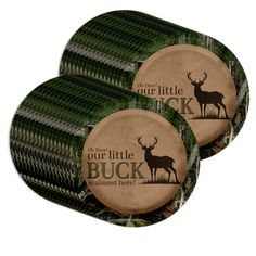 two round coasters with the words our little buck is almost here