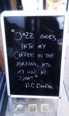 a sign on the sidewalk that says, jazz goes into my coffee in the morning