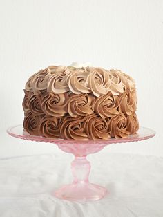 there is a cake that has been frosted with chocolate icing