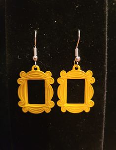 "Photo frame earrings from the hit show \"Friends\"! Perfect for any classic TV show lover!" Frame Earrings, Friends Picture, Friends Picture Frame, Classic Tv, Friend Pictures, Cute Earrings, Picture Frame, Photo Frame, Jewelry Earrings Dangle