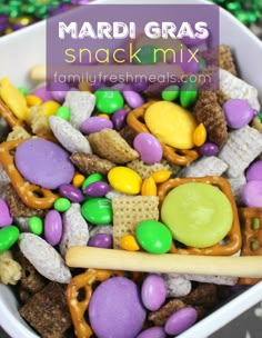 mardi gras snack mix in a white bowl