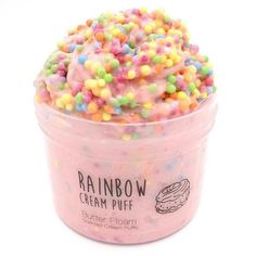 rainbow cream puff with sprinkles in a pink container on a white background